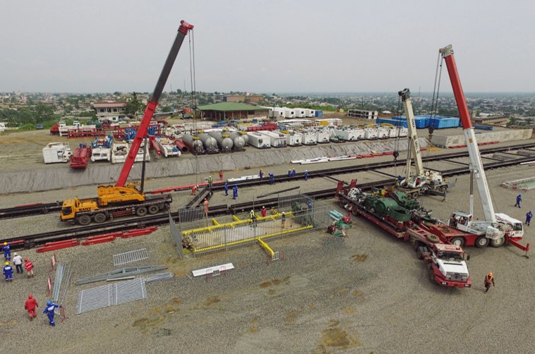Cranes and plant laid out across a major infrastructure construction yard